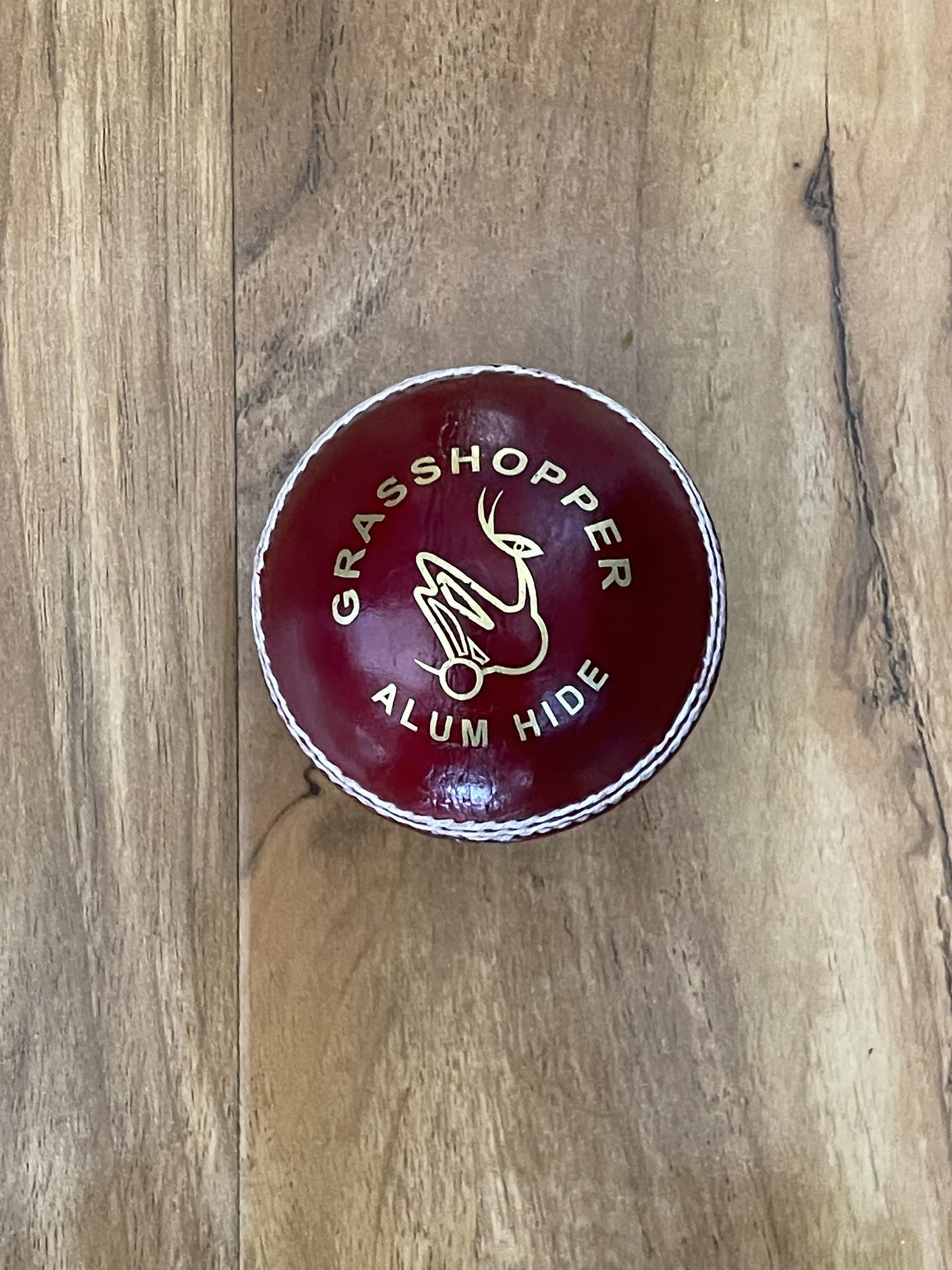 Grasshopper Beamer Red Cricket Ball - Youth Leather